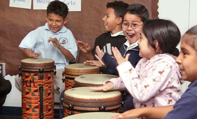Schoolchildren enjoy a drumming session at Jefferson Elementary Pasadena CA