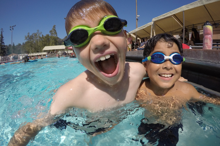 Two boys play at the Rose Bowl Aquatics Center in Pasadena CA