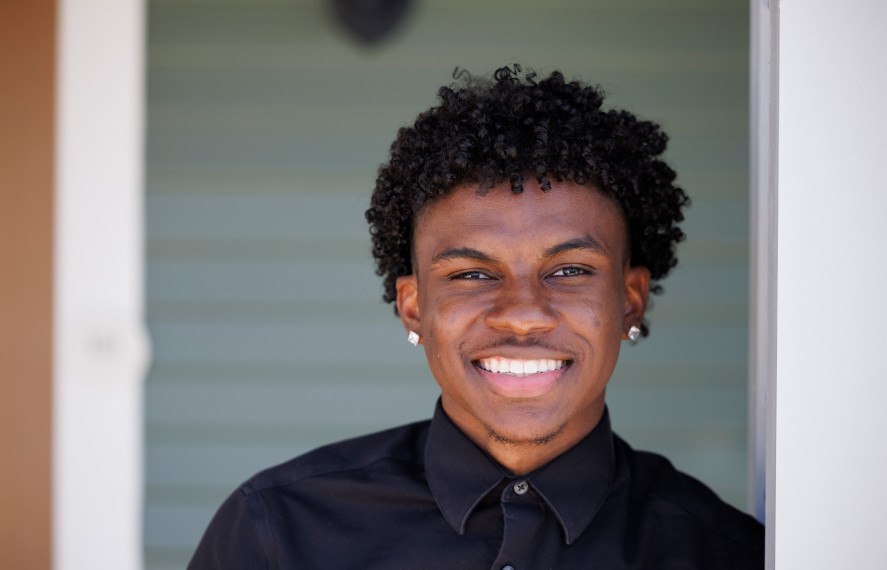 Young man smiling for a photo