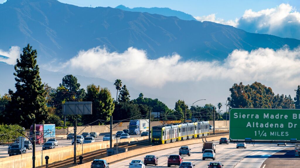 Image of freeway with California mountain range in background