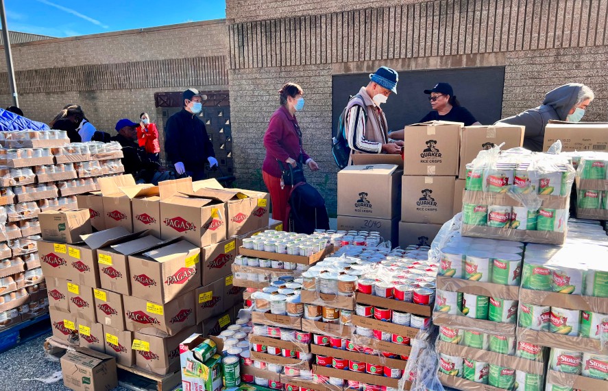 People standing in line at a Food Bank