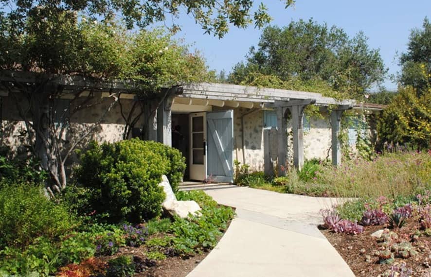 Front view of a light blue house