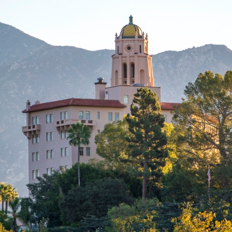 Image of dome like building with the mountains in the back