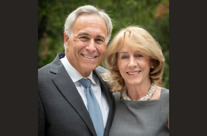 A portrait of a middle age white couple outdoors