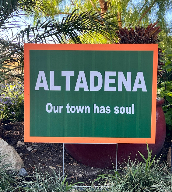 A lawn sign reads Altadena - Our town has soul