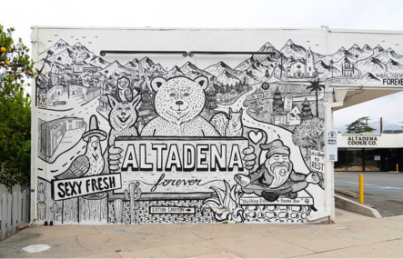 A black and white line drawn mural says Altadena Forever and shows many woodland animals